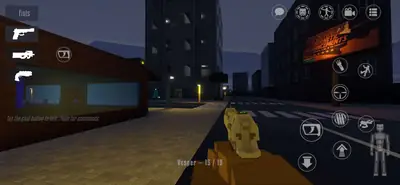 First-person view on a city street at night in GoreBox 27, holding the gold Vesper pistol with 15 rounds, buildings and a lit billboard around